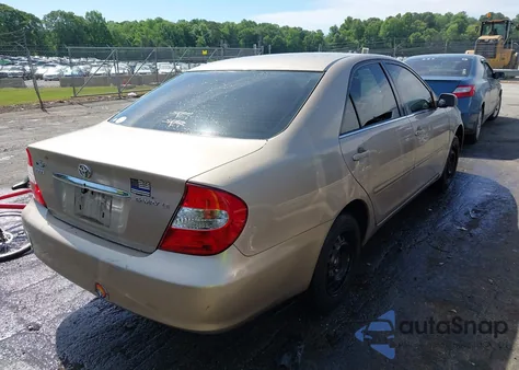2002 Toyota Camry Le z USA, uszkodzony, nr VIN 4T1BE32K92U092811